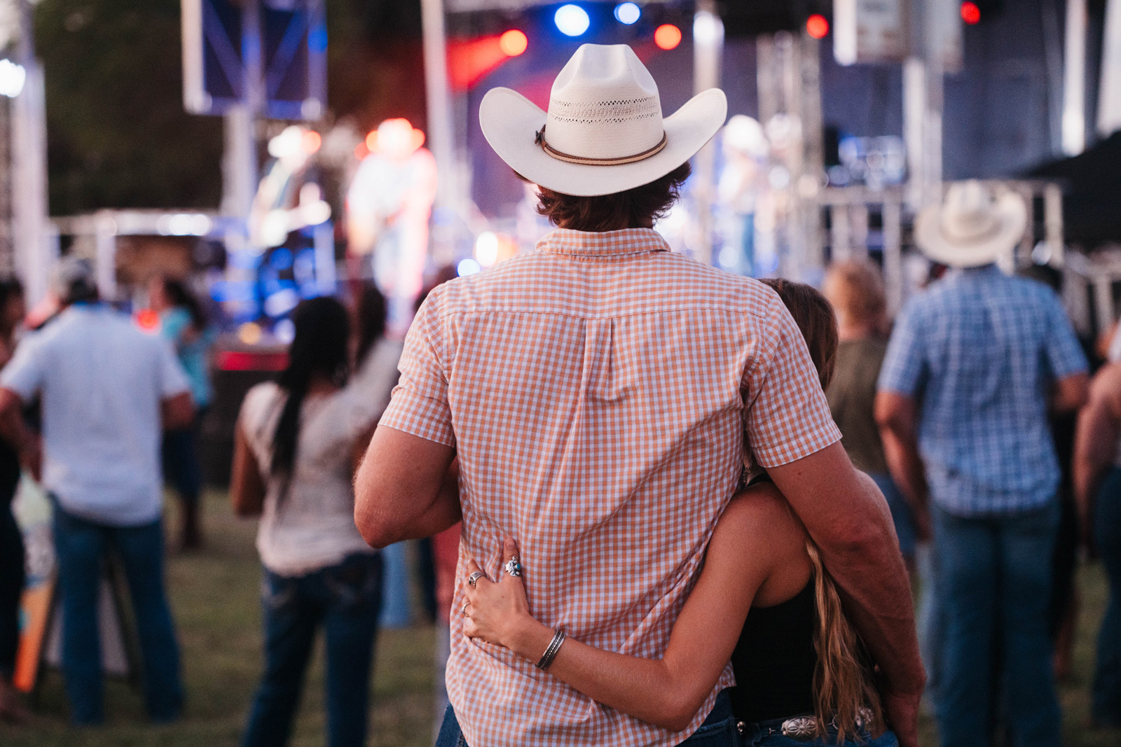 Cowboy and girlfriend dancing