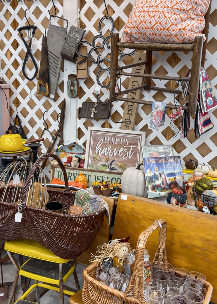 Vintage finds displayed in a themed vendor booth at My Mom Had That!