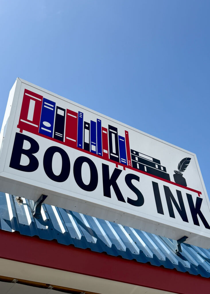 Shelves of gently used books at Books INK in Portland, Texas